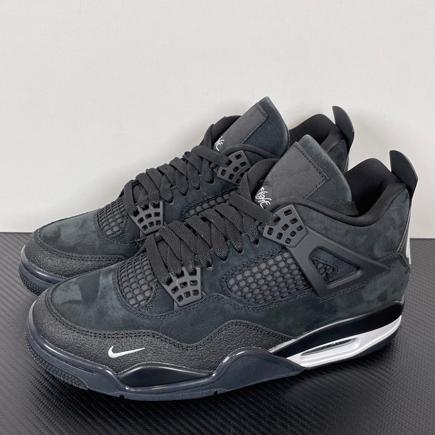 AJ4 Brick by Brick Black