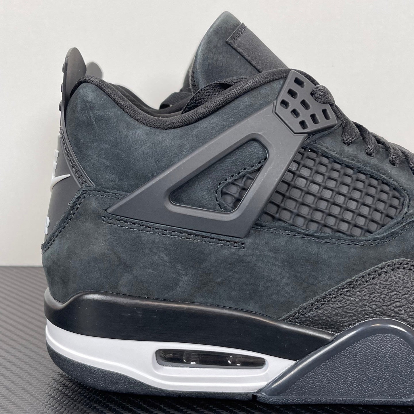 AJ4 Brick by Brick Black