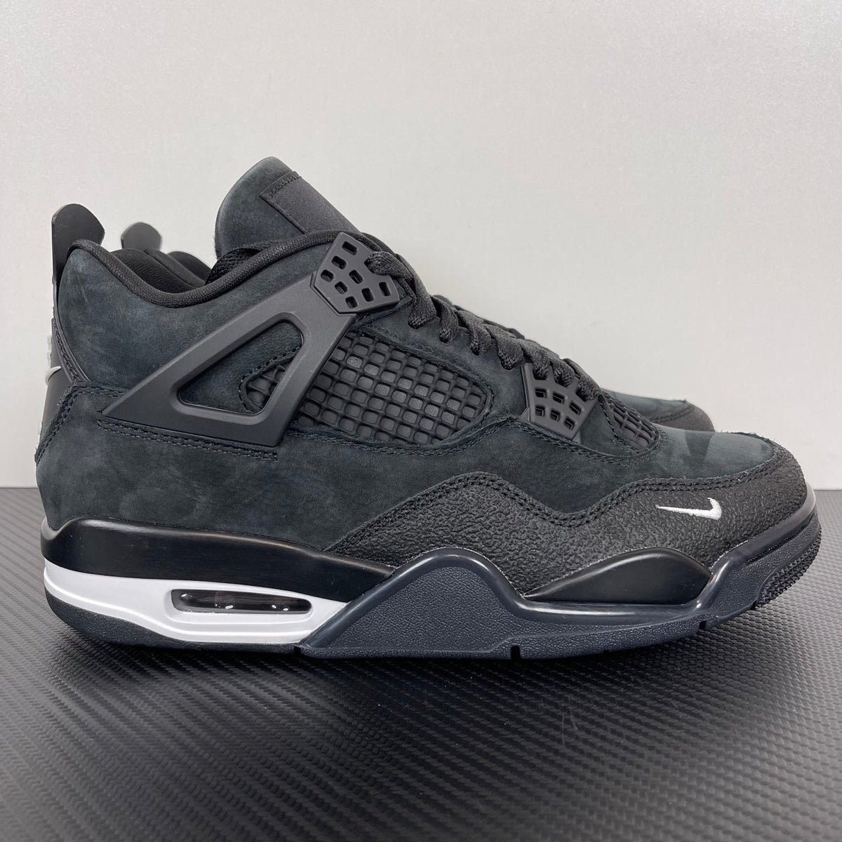 AJ4 Brick by Brick Black