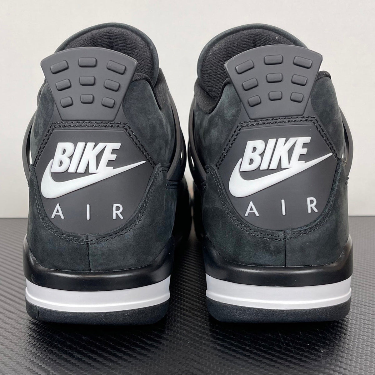 AJ4 Brick by Brick Black
